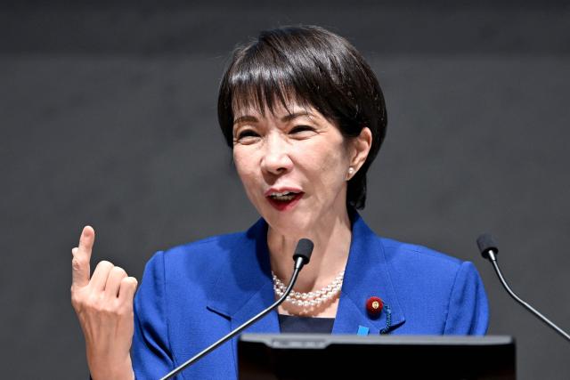 Japan's Prime Minister Sanae Takaichi delivers a speech at the 14th Council Meeting of the Japan Business Federation, or Keidanren, in Tokyo on December 25, 2025. (Photo by Kazuhiro NOGI / AFP)