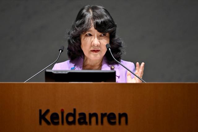 Japan's Finance Minister Satsuki Katayama delivers a speech at the 14th Council Meeting of the Japan Business Federation, or Keidanren, in Tokyo on December 25, 2025. (Photo by Kazuhiro NOGI / AFP)