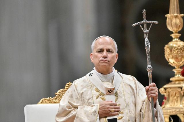 Pope Leo XIV looks on as he performs the Christmas mass at St Peter's Basilica in the Vatican on December 25, 2025. (Photo by Tiziana FABI / AFP)