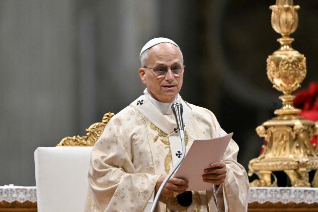 Pope Leo XIV performs the Christmas mass at St Peter's Basilica in the Vatican on December 25, 2025. (Photo by Tiziana FABI / AFP)