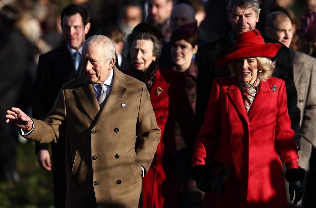 Britain's King Charles III and Britain's Queen Camilla (2R) lead Jack Brooksbank (L), Britain's Princess Anne, Princess Royal, Britain's Princess Eugenie of York, Vice Admiral Timothy Laurence and Britain's Prince Edward, Duke of Edinburgh and others as they arrive for the Royal Family's traditional Christmas Day service at St Mary Magdalene Church on the Sandringham Estate in eastern England, on December 25, 2025. (Photo by HENRY NICHOLLS / AFP)