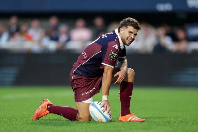 (FILES) Bordeaux-Begles' French fly-half Matthieu Jalibert looks on as he scores a try during the French Top14 rugby union match between USA Perpignan and Union Bordeaux-Begles (UBB) at the Aime-Giral stadium in Perpignan, south-western France on October 18, 2025. The weeks go by and Matthieu Jalibert, the Bordeaux-Begles fly-half, now much better in defense, continues to impress, to the point of reopening the debate on the No. 10 position in the French team before the next Six Nations Tournament. (Photo by Valentine CHAPUIS / AFP)
