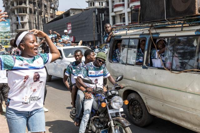 Supporters of Guinea President and presidential candidate Mamady Doumbouya gather during the last day of campaign in Conakry, on December 25, 2025, ahead of Guinea’s Presidential election on December 28, 2025. (Photo by PATRICK MEINHARDT / AFP)