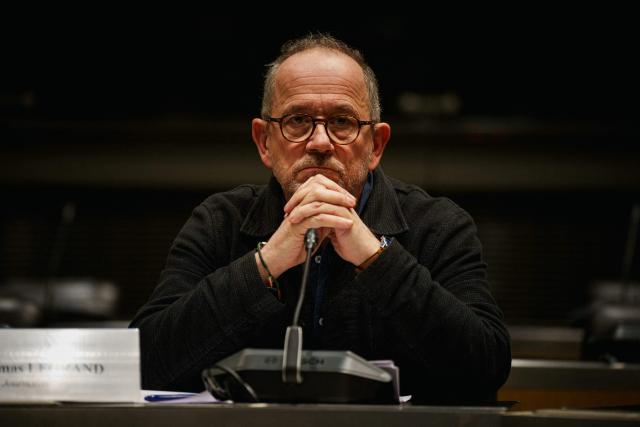 (FILES) French journalist Thomas Legrand looks on prior to the start of a hearing before the Public Audiovisual Committee of Inquiry at the National Assembly building, France's Parliament lower house, in Paris on December 18, 2025. Journalist Thomas Legrand has filed a complaint after Europe 1 disclosed information about a private conversation he had with former France Inter boss Laurence Bloch, his lawyer said on December 25, 2025. (Photo by Dimitar DILKOFF / AFP)