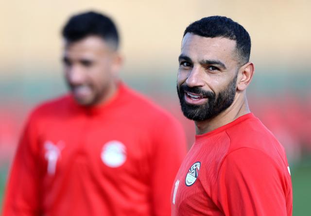 Egypt's forward #10 Mohamed Salah (R) looks on during a training session at the Stadium in Taghzout, Morocco, on December 25, 2025, on the eve of the 2025 Africa Cup of Nations (CAN) football match between Egypt and South Africa. (Photo by FRANCK FIFE / AFP)