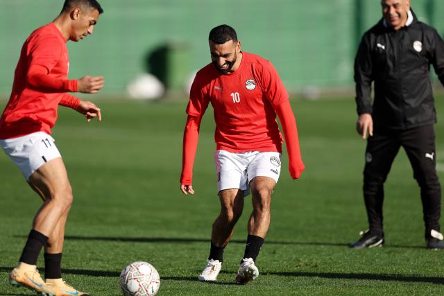 Egypt's forward MostMostafa Mohamedafa Mohamed and Egypt's forward Mohamed Salah (C) attend a training session at the Stadium in Taghzout, Morocco, on December 25, 2025, on the eve of the 2025 Africa Cup of Nations (CAN) football match between Egypt and South Africa. (Photo by FRANCK FIFE / AFP)
