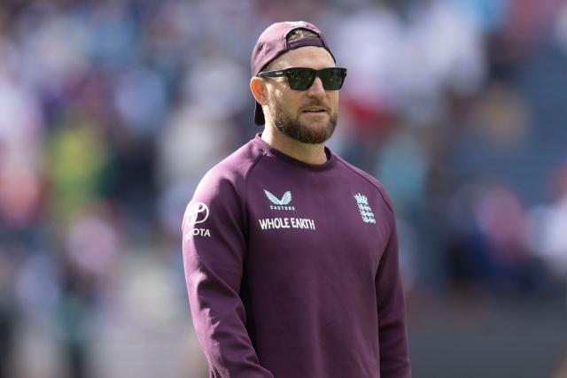 England's Head Coach Brendon McCullum watches his players warm up during the first day of the fourth Ashes cricket Test match between Australia and England at the Melbourne Cricket Ground (MCG)  in Melbourne, Australia on December 26, 2025. (Photo by Martin KEEP / AFP)
