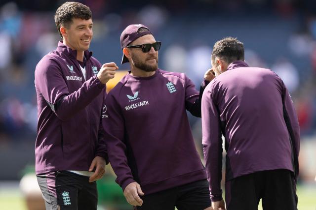 England's Head Coach Brendon McCullum (C) joins in with a game during the first day of the fourth Ashes cricket Test match between Australia and England at the Melbourne Cricket Ground (MCG)  in Melbourne, Australia on December 26, 2025. (Photo by Martin KEEP / AFP)