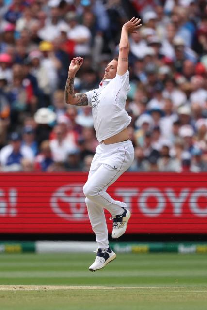England's Brydon Carse bowls during the first day of the fourth Ashes cricket Test match between Australia and England at the Melbourne Cricket Ground (MCG) in Melbourne, Australia on December 26, 2025. (Photo by Martin KEEP / AFP)