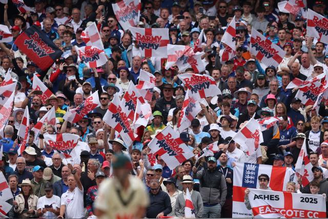 England's Barmy Army supporters cheer for their team during the first day of the fourth Ashes cricket Test match between Australia and England at the Melbourne Cricket Ground (MCG) in Melbourne, Australia on December 26, 2025. (Photo by Martin KEEP / AFP)
