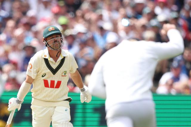 Australia's Travis Head reacts after being dismissed by England's Gus Atkinson during the first day of the fourth Ashes cricket Test match between Australia and England at the Melbourne Cricket Ground (MCG) in Melbourne on December 26, 2025. (Photo by Martin KEEP / AFP)
