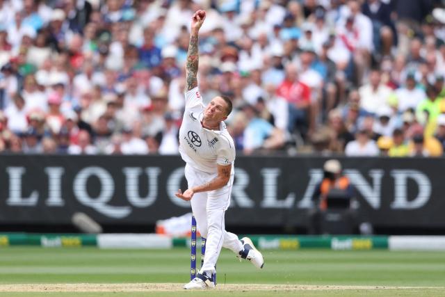 England's Brydon Carse bowls during the first day of the fourth Ashes cricket Test match between Australia and England at the Melbourne Cricket Ground (MCG) in Melbourne on December 26, 2025. (Photo by Martin KEEP / AFP)