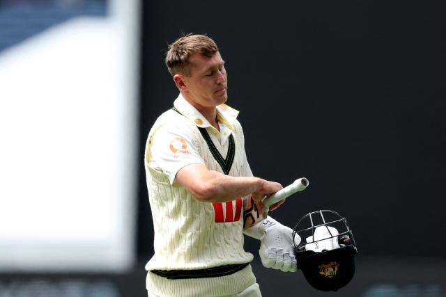 Australia's Marnus Labuschagne leaves the field after being dismissed during the first day of the fourth Ashes cricket Test match between Australia and England at the Melbourne Cricket Ground (MCG) in Melbourne on December 26, 2025. (Photo by Martin KEEP / AFP)