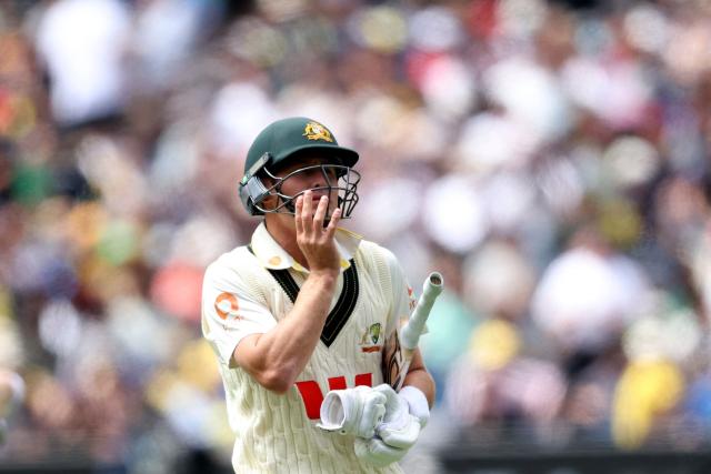 Australia's Marnus Labuschagne leaves the field after being dismissed during the first day of the fourth Ashes cricket Test match between Australia and England at the Melbourne Cricket Ground (MCG) in Melbourne on December 26, 2025. (Photo by Martin KEEP / AFP)