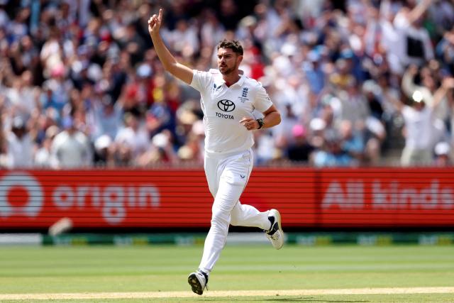 England's Josh Tongue celebrates after dismissing Australia's Marnus Labuschagne during the first day of the fourth Ashes cricket Test match between Australia and England at the Melbourne Cricket Ground (MCG) in Melbourne on December 26, 2025. (Photo by Martin KEEP / AFP)