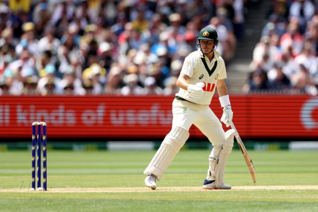 Australia's Marnus Labuschagne looks back after being dismissed during the first day of the fourth Ashes cricket Test match between Australia and England at the Melbourne Cricket Ground (MCG) in Melbourne on December 26, 2025. (Photo by Martin KEEP / AFP)