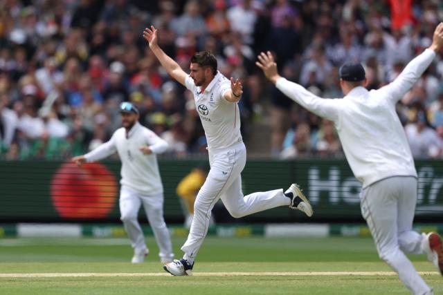 England's Josh Tongue celebrates the wicket of Australia's Steve Smith during the first day of the fourth Ashes cricket Test match between Australia and England at the Melbourne Cricket Ground (MCG) in Melbourne on December 26, 2025. (Photo by Martin KEEP / AFP)