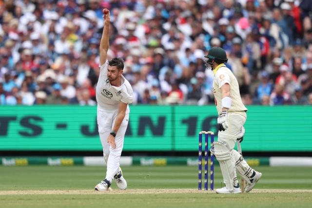 England's Josh Tongue bowls during the first day of the fourth Ashes cricket Test match between Australia and England at the Melbourne Cricket Ground (MCG) in Melbourne on December 26, 2025. (Photo by Martin KEEP / AFP)