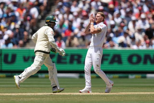 England's Ben Stokes (R) reacts after bowling during  the first day of the fourth Ashes cricket Test match between Australia and England at the Melbourne Cricket Ground (MCG) in Melbourne on December 26, 2025. (Photo by Martin KEEP / AFP)
