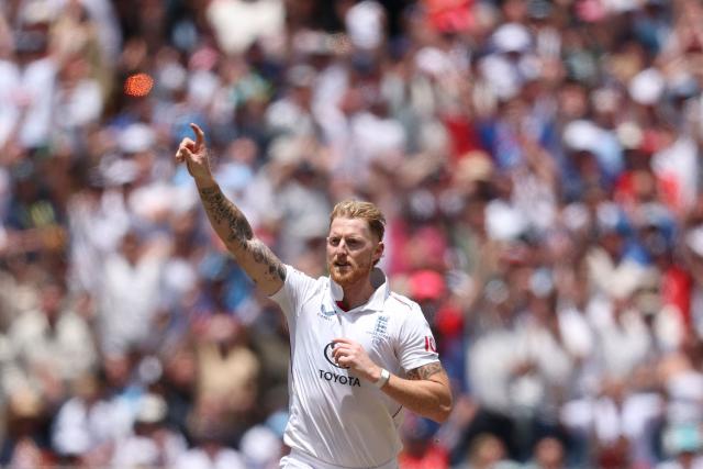 England's Ben Stokes celebrates the wicket of Australia's Alex Carey during the first day of the fourth Ashes cricket Test match between Australia and England at the Melbourne Cricket Ground (MCG) in Melbourne on December 26, 2025. (Photo by Martin KEEP / AFP)