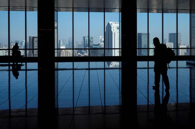 This photo taken on November 28, 2025 shows the view from the lobby of a high-rise building in Tokyo. The Japanese government approved on December 26, a record budget for the upcoming fiscal year, media reported, to pay for everything from bigger defence spending to ballooning social security costs as persistent inflation continues to bite. (Photo by Kazuhiro NOGI / JIJI Press / AFP) / Japan OUT