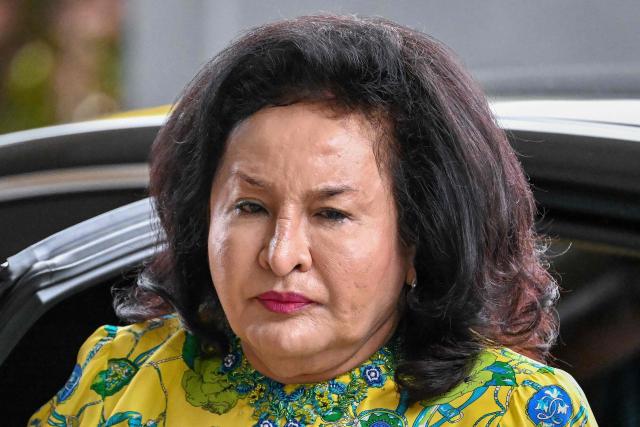 (FILES) Rosmah Mansor, wife of Malaysia's jailed former prime minister Najib Razak, arrives during her husband's 1Malaysia Development Berhad (1MDB) audit tampering case hearing at the High court in Kuala Lumpur on March 3, 2023. Former Malaysian prime minister Najib Razak was found guilty on December 26, 2025 of abusing his power to plunder millions of dollars from the country's now defunct sovereign wealth fund and laundering the proceeds. (Photo by Mohd RASFAN / AFP)