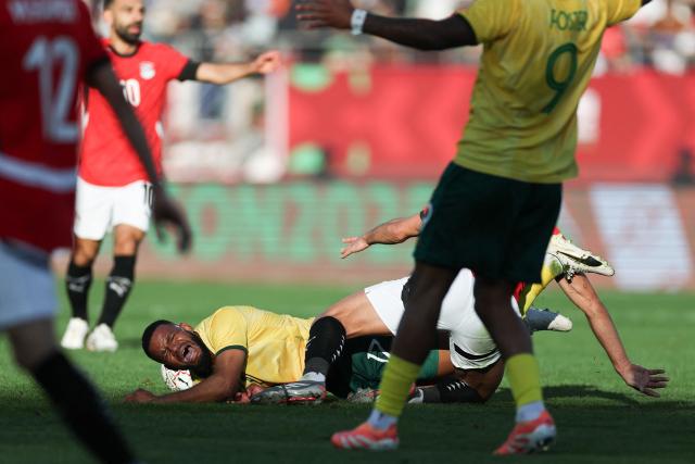 South Africa's midfielder #17 Sipho Mbule reacts in a tackle during the Africa Cup of Nations (CAN) Group B football match between Egypt and South Africa at Adrar Stadium in Agadir on December 26, 2025. (Photo by FRANCK FIFE / AFP)
