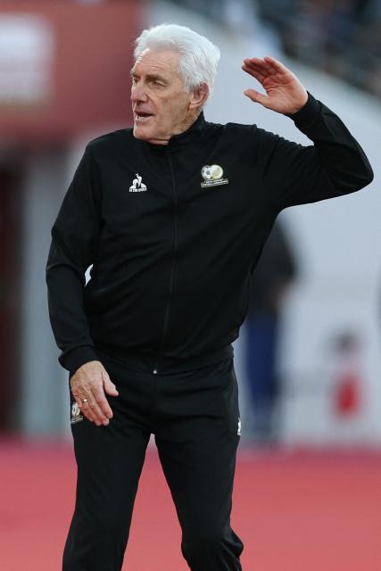 South Africa's head coach Hugo Broos reacts after being denied a penalty during the Africa Cup of Nations (CAN) Group B football match between Egypt and South Africa at Adrar Stadium in Agadir on December 26, 2025. (Photo by FRANCK FIFE / AFP)