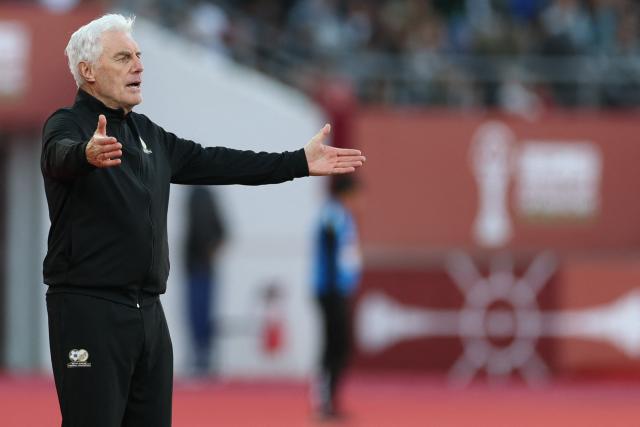 South Africa's head coach Hugo Broos reacts after being denied a penalty during the Africa Cup of Nations (CAN) Group B football match between Egypt and South Africa at Adrar Stadium in Agadir on December 26, 2025. (Photo by FRANCK FIFE / AFP)