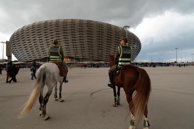 Mounted officers patrol outside the stadium ahead of the Africa Cup of Nations (CAN) Group A football match between Morocco and Mali at Prince Moulay Abdellah Stadium in Rabat on December 26, 2025. (Photo by Abdel Majid BZIOUAT / AFP)