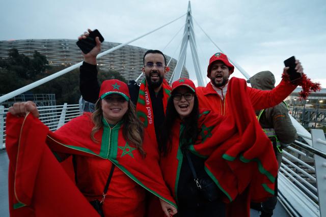 Morocco supporters arrive for the Africa Cup of Nations (CAN) Group A football match between Morocco and Mali at Prince Moulay Abdellah Stadium in Rabat on December 26, 2025. (Photo by Abdel Majid BZIOUAT / AFP)