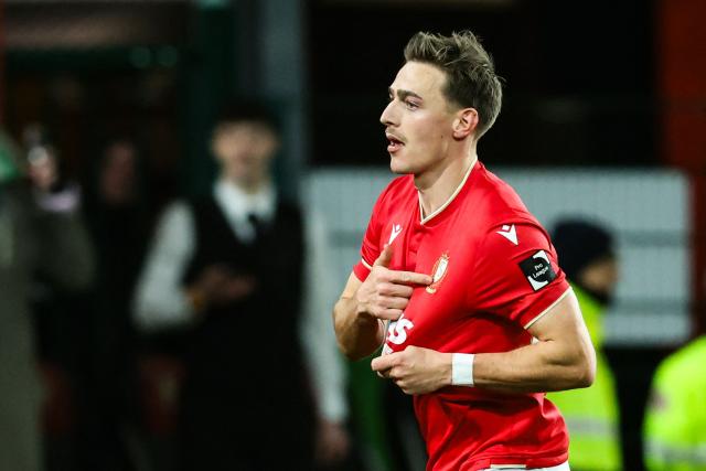 Standard Liege's Danish midfielder #94 Casper Nielsen reacts after scoring a goal during the Belgian Pro League football match between Standard de Liege and Sint-Truiden VV at the Maurice Dufrasne Stadium in Liege, on December 26, 2025. (Photo by BRUNO FAHY / Belga / AFP) / Belgium OUT