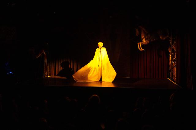French Laurette de Paname dances during the annual Festival du Merveilleux at the Musee des Arts Forains in Paris on December 26, 2025. (Photo by Dimitar DILKOFF / AFP)