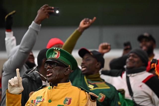 Mali supporters arrive for the Africa Cup of Nations (CAN) Group A football match between Morocco and Mali at Prince Moulay Abdellah Stadium in Rabat on December 26, 2025. (Photo by Gabriel BOUYS / AFP)