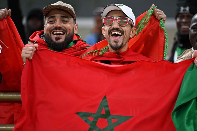 Morocco supporters arrive for the Africa Cup of Nations (CAN) Group A football match between Morocco and Mali at Prince Moulay Abdellah Stadium in Rabat on December 26, 2025. (Photo by Gabriel BOUYS / AFP)
