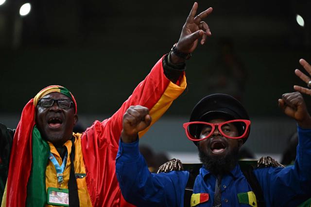 Mali supporters arrive for the Africa Cup of Nations (CAN) Group A football match between Morocco and Mali at Prince Moulay Abdellah Stadium in Rabat on December 26, 2025. (Photo by Gabriel BOUYS / AFP)