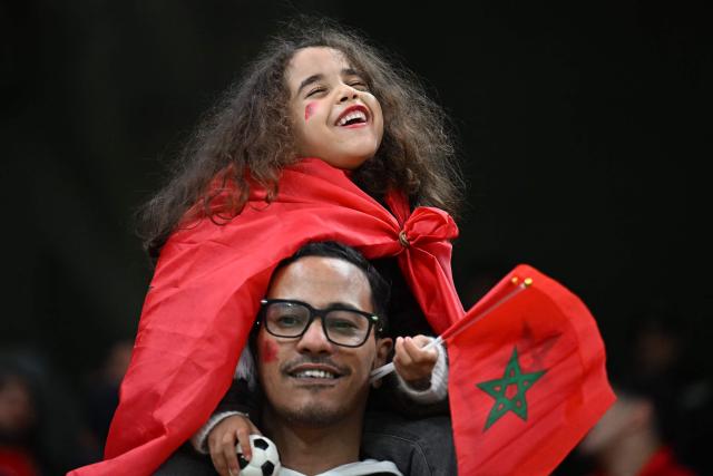Morocco supporters arrive for the Africa Cup of Nations (CAN) Group A football match between Morocco and Mali at Prince Moulay Abdellah Stadium in Rabat on December 26, 2025. (Photo by Gabriel BOUYS / AFP)