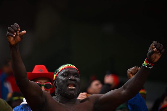 Mali supporters arrive for the Africa Cup of Nations (CAN) Group A football match between Morocco and Mali at Prince Moulay Abdellah Stadium in Rabat on December 26, 2025. (Photo by Gabriel BOUYS / AFP)
