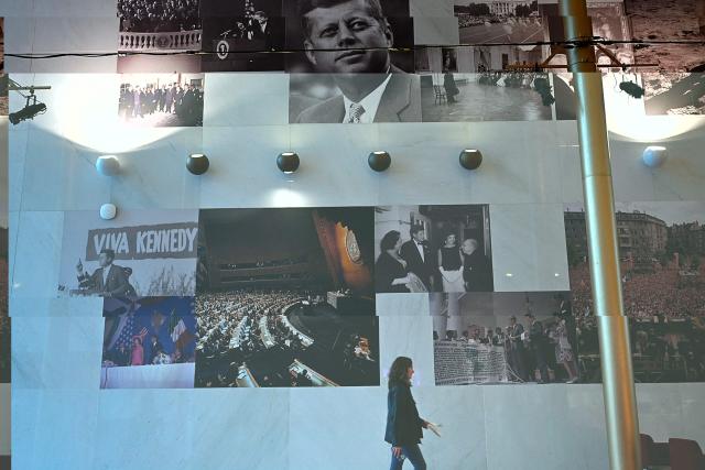 People visit the John F. Kennedy Center for the Performing Arts, which was recently renamed the "Trump Kennedy Center," in Washington, DC,  on December 26, 2025. US President Donald Trump's name was affixed to the Kennedy Center in Washington on December 19, 2025, one day after his hand-picked board members voted to rename the arts venue in spite of legal questions. (Photo by Brendan Smialowski / AFP)