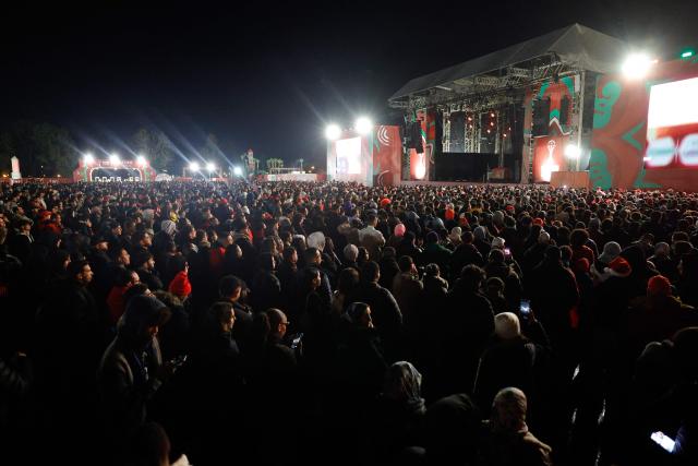 Morocco supporters watch at the Rabat Fanzone the Africa Cup of Nations (CAN) Group A football match between Morocco and Mali at Prince Moulay Abdellah Stadium in Rabat on December 26, 2025. (Photo by Abdel Majid BZIOUAT / AFP)