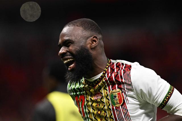 Mali's forward #17 Lassine Sinayoko celebrates scoring a penalty during the Africa Cup of Nations (CAN) Group A football match between Morocco and Mali at Prince Moulay Abdellah Stadium in Rabat on December 26, 2025. (Photo by Gabriel BOUYS / AFP)