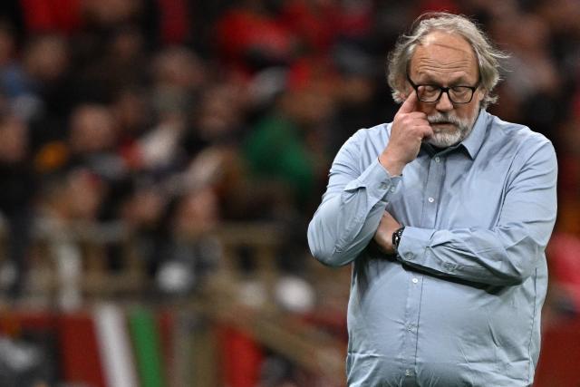 Mali's head coach Tom Saintfiet reacts after his team scored during the Africa Cup of Nations (CAN) Group A football match between Morocco and Mali at Prince Moulay Abdellah Stadium in Rabat on December 26, 2025. (Photo by Gabriel BOUYS / AFP)