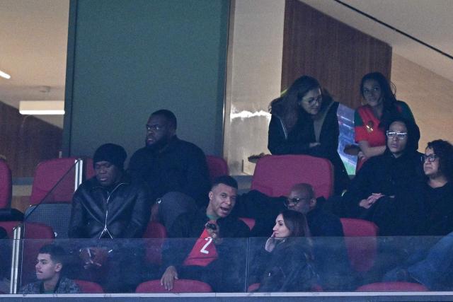French association footballer Kylian Mbappe watches the Africa Cup of Nations (CAN) Group A football match between Morocco and Mali at Prince Moulay Abdellah Stadium in Rabat on December 26, 2025. (Photo by Gabriel BOUYS / AFP)