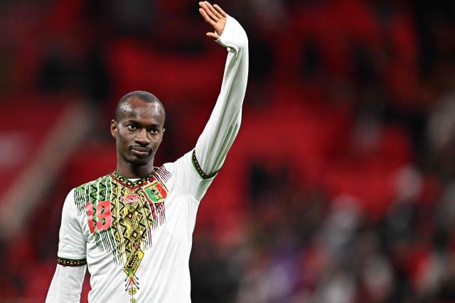Mali's midfielder #19 Kamory Doumbia reacts after the Africa Cup of Nations (CAN) Group A football match between Morocco and Mali at Prince Moulay Abdellah Stadium in Rabat on December 26, 2025. (Photo by Gabriel BOUYS / AFP)