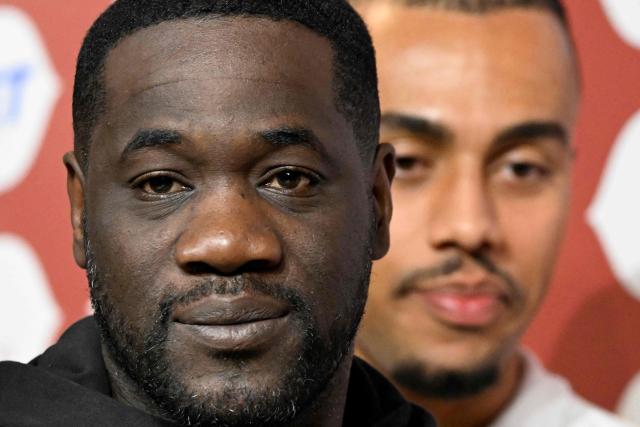 Ivory Coast's head coach Emerse Fee (L) and Ivory Coast's defender #17 Guela Doue attend a press conference in Marrakesh, on December 27, 2025, on the eve of the 2025 Africa Cup of Nations (CAN) football match between Cameroon and Ivory Coast. (Photo by Khaled DESOUKI / AFP)