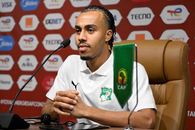 Ivory Coast's defender #17 Guela Doue attends a press conference in Marrakesh, on December 27, 2025, on the eve of the 2025 Africa Cup of Nations (CAN) football match between Cameroon and Ivory Coast. (Photo by Khaled DESOUKI / AFP)