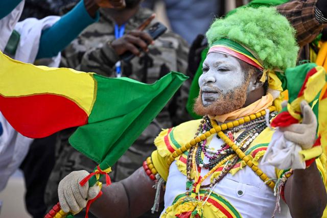 A supporter of Benin cheers prior the Africa Cup of Nations (CAN) Group D football match between Benin and Botswana at Rabat Olympic Stadium in Rabat on December 27, 2025. (Photo by Paul ELLIS / AFP)