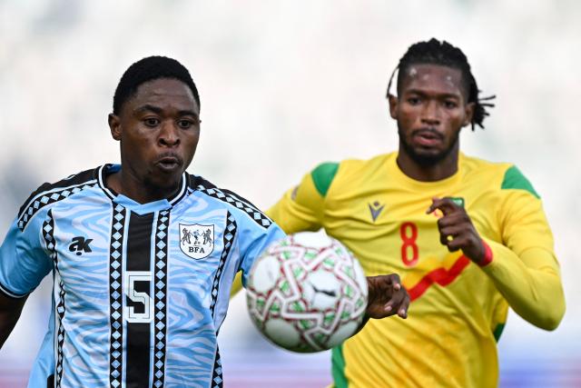 Botswana's defender #05 Alford Velaphi and Benin's midfielder #08 Imourane Hassane vie during the Africa Cup of Nations (CAN) Group D football match between Benin and Botswana at Rabat Olympic Stadium in Rabat on December 27, 2025. (Photo by Paul ELLIS / AFP)