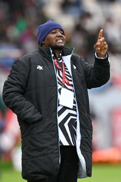 Botswana's head coach Morena Ramoreboli reacts during the Africa Cup of Nations (CAN) Group D football match between Benin and Botswana at Rabat Olympic Stadium in Rabat on December 27, 2025. (Photo by Paul ELLIS / AFP)
