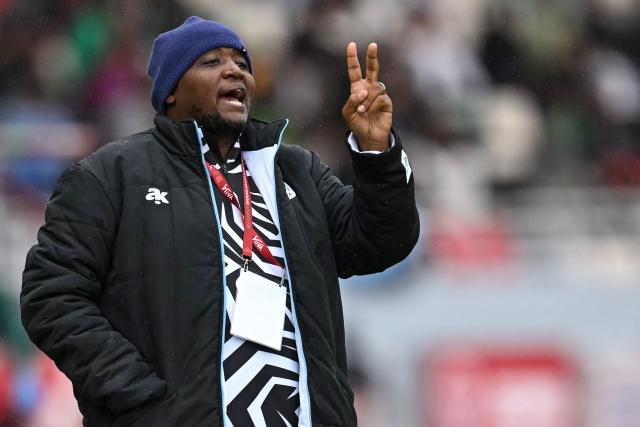 Botswana's head coach Morena Ramoreboli reacts during the Africa Cup of Nations (CAN) Group D football match between Benin and Botswana at Rabat Olympic Stadium in Rabat on December 27, 2025. (Photo by Paul ELLIS / AFP)